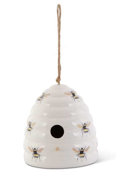 white ceramic beehive birdhouse